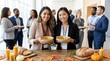 © mashimara - Diverse professionals enjoy a warm soup and bread reception at a conference event