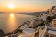 © Mat Hayward - A serene sunset view from Imerovigli, Santorini, overlooking the iconic caldera and the Aegean Sea. Warm golden‑hour light illuminates the whitewashed Cycladic architecture,  and dramatic cliffs.