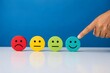© Jakia Sultana - Customer satisfaction rating concept with colorful emoticon faces