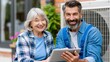 © InfiniteStudio - Technician explains outdoor air source heat pump unit to senior homeowner during home visit in bright daylight