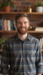 © Creativar - Smiling Bearded Man Home Office Portrait