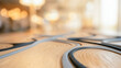 © Celt Studio - Wooden surface texture curved grey black lines embedded detail abstract modern interior design element blurred background warm lighting macro photography perspective