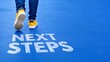 © Vivid_Vision - Next Steps concept with person walking on blue background