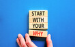 © Dzmitry - Start with your why words symbol. Concept words Start with your why on beautiful wooden blocks. Beautiful blue background. Businessman hand. Business start with your why concept. Copy space.