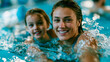 © Aliaksandra - Mother supports her young daughter during a swimming lesson in an indoor pool, illustrating safety, trust, learning, and family bonding