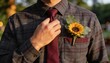 © Ksenia - Groom flannel shirt tie closeup with red necktie and sunflower boutonniere detail
