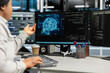 © DC Studio - Data center expert applying AI technology to reduce downtime. African American professional at work designs and implements AI driven solutions for server facility equipment.