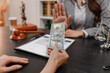 © PHOTO4U - Concept of bribery, corruption, and unethical business practices with cash offered during a legal contract meeting, highlighting financial crime, integrity, compliance, and corporate ethics.
