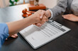 © PHOTO4U - Concept of bribery, corruption, and unethical business practices with cash offered during a legal contract meeting, highlighting financial crime, integrity, compliance, and corporate ethics.