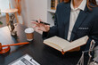 © PHOTO4U - Professional legal consultation with a lawyer explaining legal procedures, reviewing contracts, and advising clients during a case discussion in a modern law office, representing justice and trust.