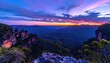 © Dabo - Dramatic sunset paints the sky over a mountainous landscape.