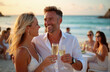 © Viktor - Smiling couple holds champagne glasses at beach event sunset. Elegant man woman toast during seaside banquet. Happy people celebrate luxury vacation lifestyle enjoying warm evening.