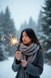 © Maryna - Young woman holds burning sparkler in snowy pine forest. Asian girl wears grey sweater scarf in cold weather environment. Glowing light shines bright at winter evening outdoor. Female enjoys magic