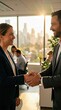 © Ирина Батюк - Diverse business professionals sharing a confident handshake, symbolizing successful partnership, mutual agreement, and future growth in a contemporary corporate environment, bright urban backdrop