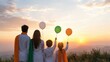 © Miracle - Celebrating Unity and Hope: A Family Embracing the Sunset with Colorful Balloons Amidst a Beautiful Natural Landscape