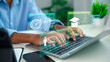 © Ao Zaa Studio - person typing on laptop keyboard with virtual icon interface for e-learning, online education, business training course, professional growth and upskilling concept.