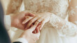 © KIMA - Close-Up of Exchanging Wedding Rings During a Romantic Wedding Ceremony