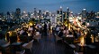 © Blur backgrounds - Rooftop bar night cityscape blurred people social lifestyle luxury dining urban atmosphere evening lights bokeh restaurant outdoor terrace nightlife