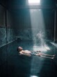 © AdPremium - Man floating peacefully in a traditional indoor hot spring with dramatic sunlight