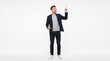 © Sueliton - Smiling young man in navy blazer pointing at empty space