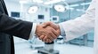 © Gophotograph - A business handshake between a businessman and a doctor representing a medical and pharma deal.
