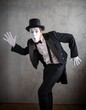 © Nomad_Soul - Mime actor in dynamic running pose with an astonished expression
