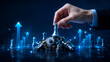 © Yuparet - Strategic planning for future growth is illustrated by creative montage of chess pieces and gears symbolizing vision and success in 2027 with confident hand making decisive move