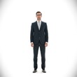 © ndandut - Full body shot of a confident businessman in a dark suit and light blue tie.