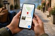 © Formoney - A person holds a smartphone showing map details while standing in a cobblestone street. A bag and suitcase are nearby. The cafe has five stars and many reviews.