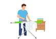 © Jepry - Man ironing clothes on an ironing board at home.