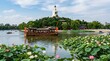 © sabda - Traditional Wooden Tour Boat Floating on Lotus Lake with White Pagoda Hill