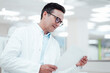 © Westend61 - Man in lab coat analyzing medical reports in laboratory
