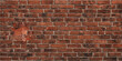 © NISAT AKTHER - Red brick wall closeup showing masonry texture with architectural construction details and uniform horizontal background surface pattern