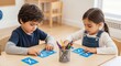 © MDIMRAN - Children learning letters in a classroom