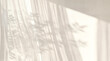 © GraphicsWorld - Minimalist sheer curtain shadows on beige wall, soft sunlight window light pattern, airy home interior background texture