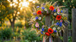 © Argiduna - Corona floral artesanal con flores frescas para celebraciones tradicionales en un entorno natural.