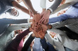 © Katsiaryna - Many hands together, group of joining hands