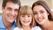 © MargoArt - Close-up happy family with a mother, father, and their little blonde daughter smiling joyfully with perfect white teeth