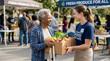 © Matos - Volunteer hands a box of fresh produce to a happy senior woman at a food share event