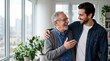 © Unknown OP - Older and younger men sharing a warm conversation in a bright home interior