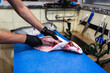 © ADDICTIVE STOCK - Fishmonger preparing fresh fish in Lisbon market
