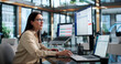 © Andrey Popov - Woman Manager Analyzes Supplier Contracts On Laptop