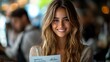 © Kecil - Smiling woman with long hair holds a menu in a cafe setting. Soft focus background