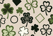 © Rafiya1727 - Seamless pattern of green and black shamrocks with geometric shapes on a light beige background for Saint Patrick.