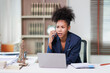 © Tj - Professional lawyer woman receiving bad news on a phone call while working in her office, experiencing stress and a challenging situation