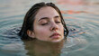 © PNG Hat - Serene young woman floating in water with eyes closed peaceful expression natural light tranquil scene emotional portrait