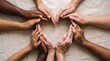 © Mikhail - Diverse hands forming a heart shape together. Group of man woman and kid showing unity and support. Concept of inclusivity and community connection as a symbol of love and equality.