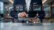 © Izdihaar - Financial growth business intelligence dashboard with market insights and revenue tracking analytics on digital tablet