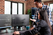 © DC Studio - Programmers review security data and trace a cyber attack source, working together on system protection, firewall coverage and threat response as part of a natural cybersecurity workspace moment.