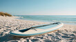 © Souphab - Stand Up Paddle Board on White Sand Beach with Calm Blue Ocean, Summer Vacation, Coastal Travel, Water Sport Background